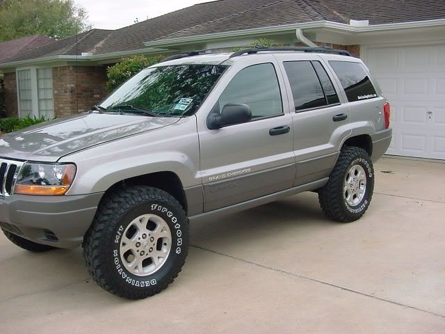 My Jeep Grand Cherokee w/3.5 inch lift, Rubicon shocks, and a lot of bang 