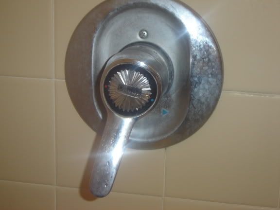 removing american standard shower handle