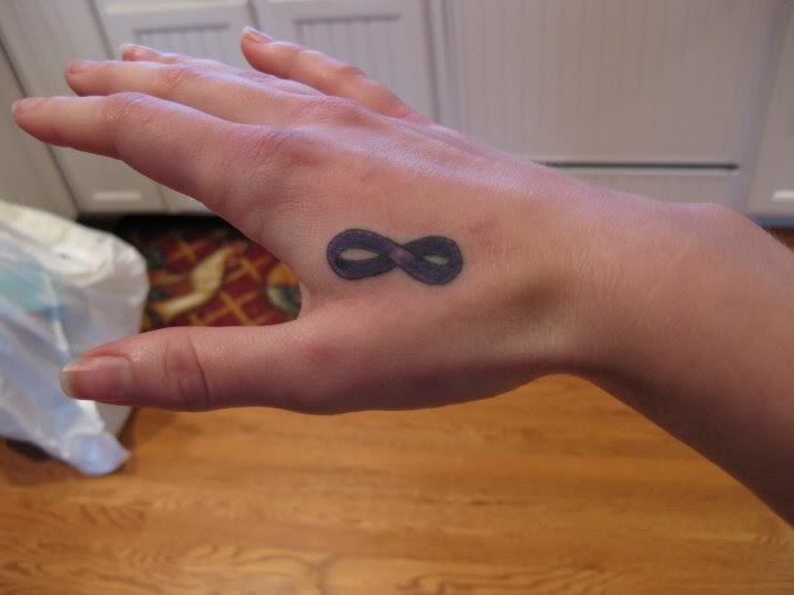 This is the purple infinity symbol I got on my right hand! Tat #2!