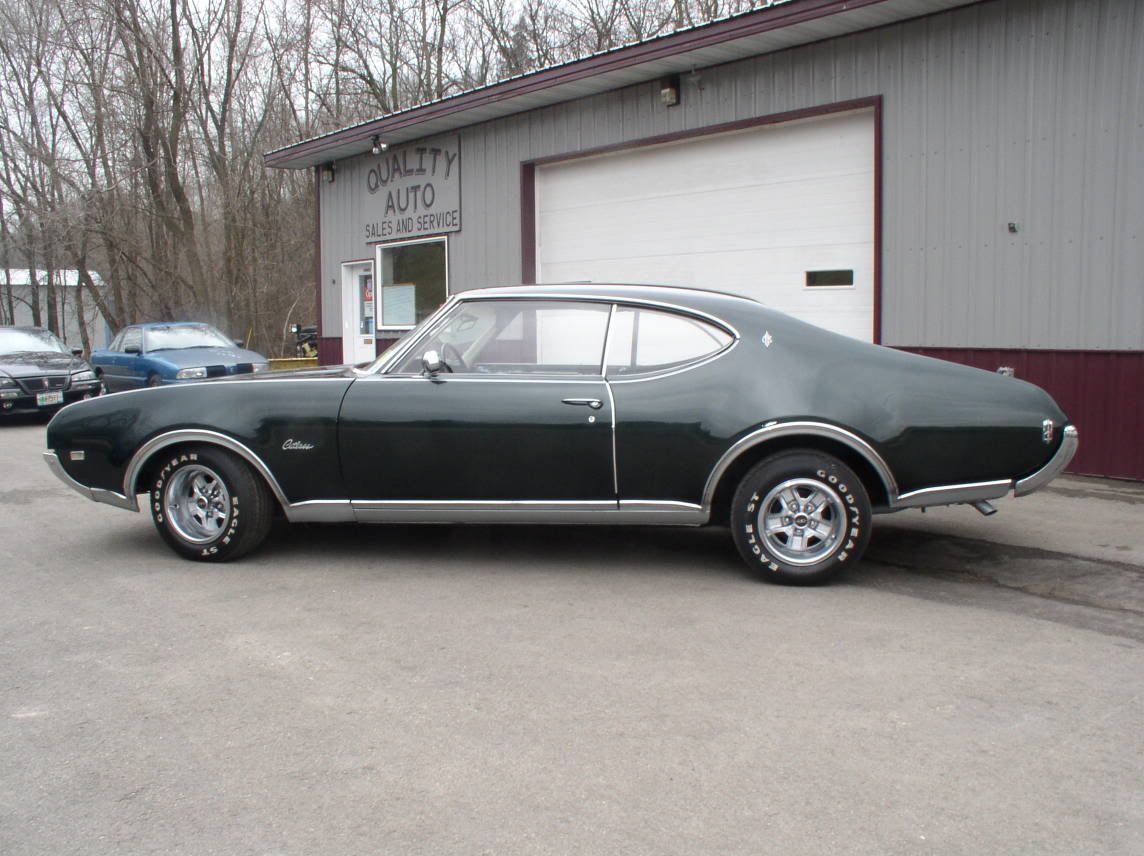 1969 cutlass wheel well chrome molding