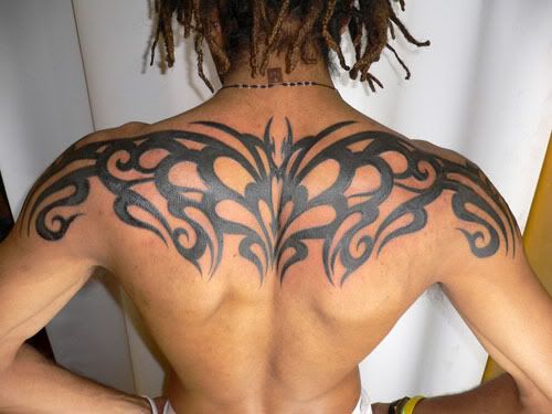 tribal tattoo upper back. Upper back tribal tattoo